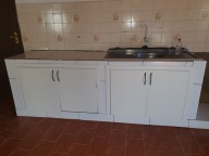 VENDO CASA EN KM 06 LADO ACARAY SOBRE ASFALTADO A 400 M